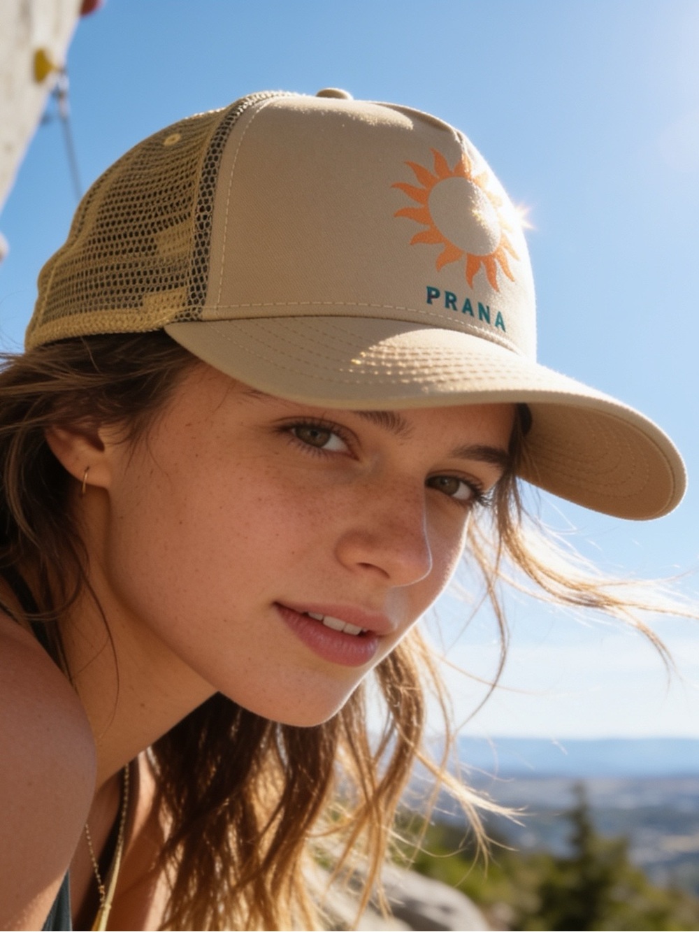 PRANA Beige Trucker Hat with Orange Sun and Teal Logo